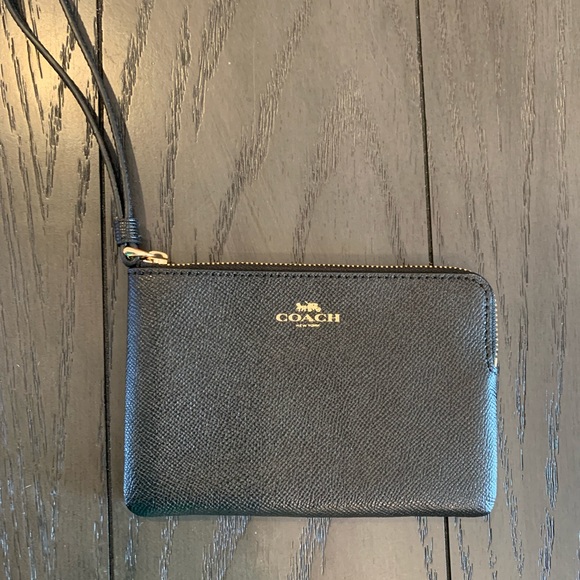 Coach Handbags - Coach wristlet wallet. Used once. Like new.
